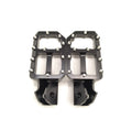 Black Surron upgraded pegs